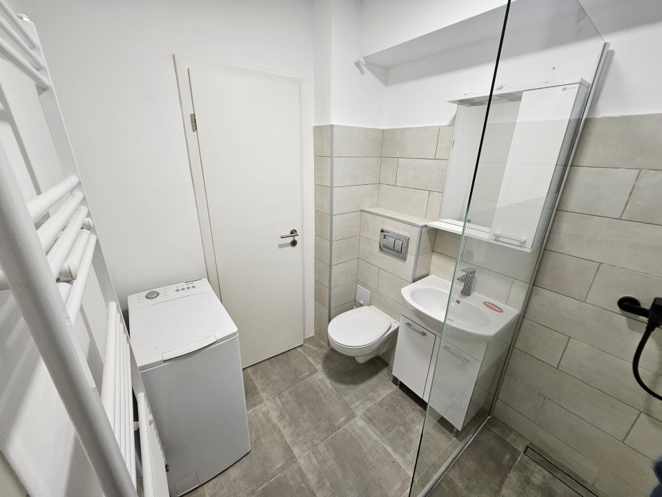 APARTAMENT DE INCHIRIAT 2 CAMERE - ZONA CENTRALA - PARTER -57mp