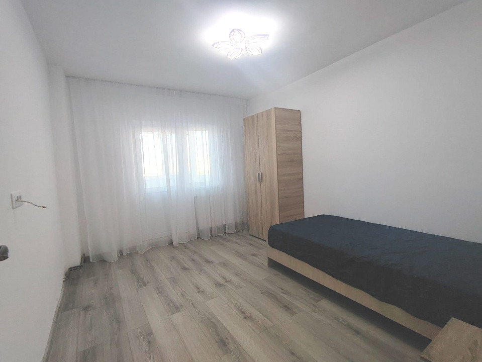 Apartament modern central-cu loc parcare privat