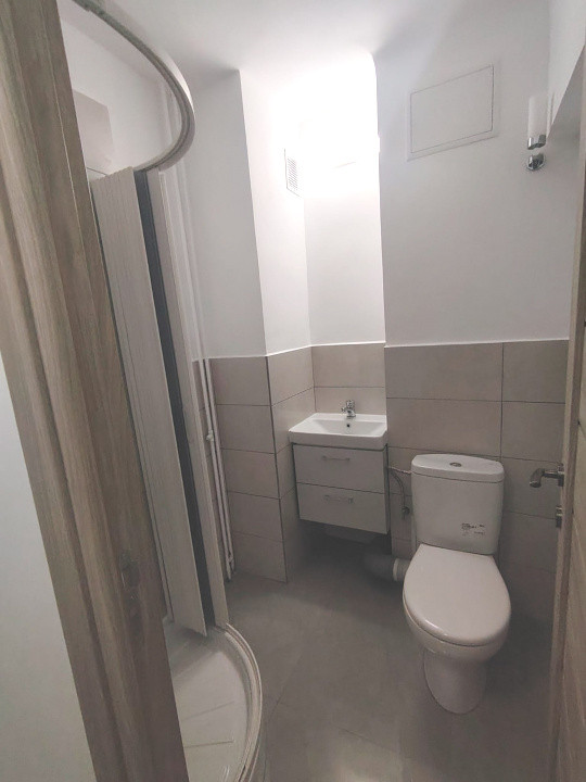 Apartament modern central-cu loc parcare privat