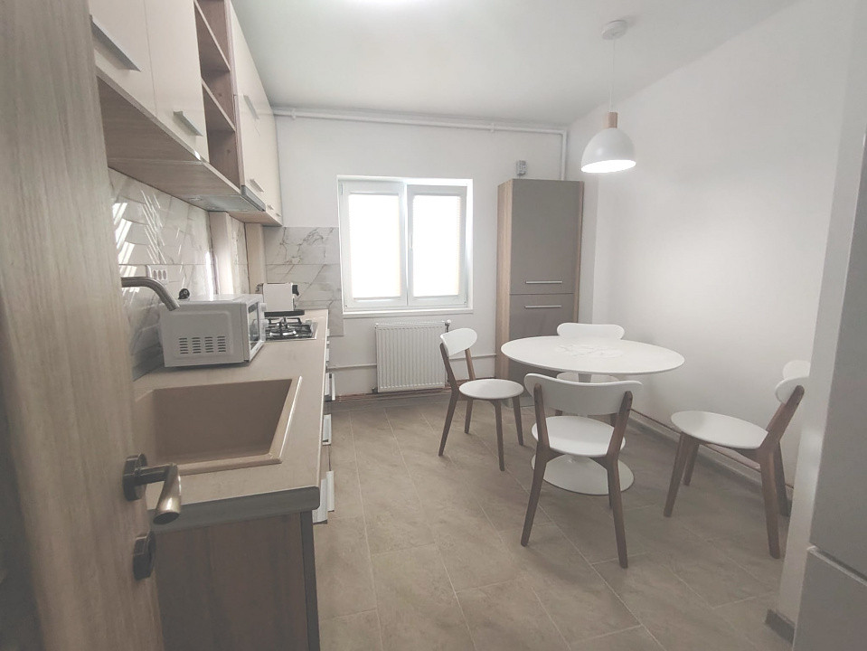 Apartament modern central-cu loc parcare privat