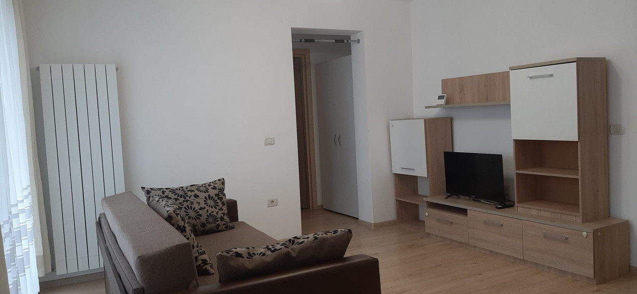 Studio 58 mp, etaj intermediar, cu loc de parcare inclus, situat in Top City