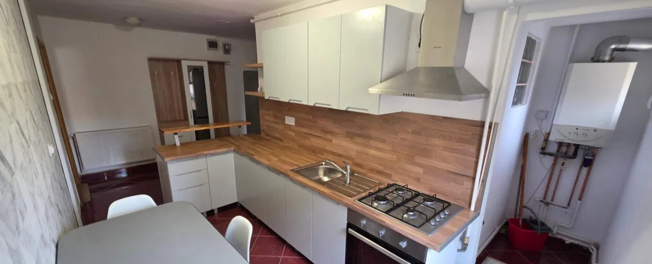Apartament cu 2 camere, suprafata de 56mp, acces la  beci din bucatarie, Racadau