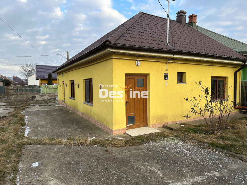 Pașcani - Casă la gri cu teren 450mp, încălzire în pardoseală, utilități incluse