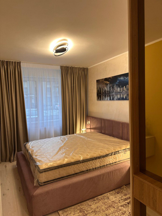 Apartament 2 camere 56 mp, cu balcon si loc de parcare, situat in Tractorul