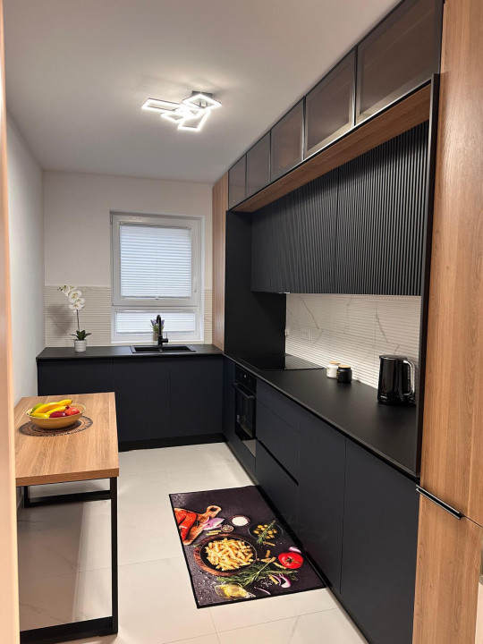 Apartament 2 camere 56 mp, cu balcon si loc de parcare, situat in Tractorul