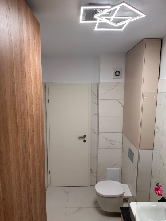 Apartament 2 camere 56 mp, cu balcon si loc de parcare, situat in Tractorul