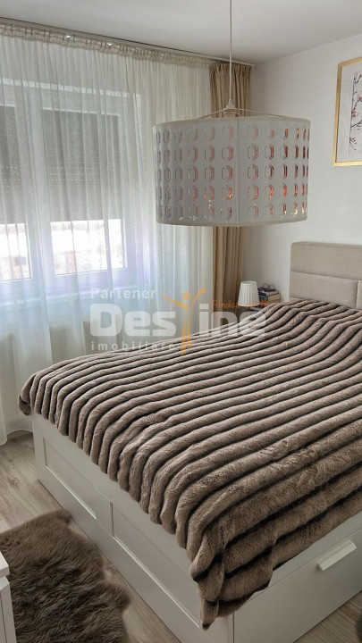 Apartament cu 2 camere mobilat utilat, cu loc de parcare parcare, zona Coresi
