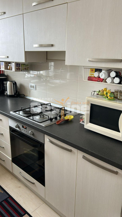 Apartament cu 2 camere mobilat utilat, cu loc de parcare parcare, zona Coresi