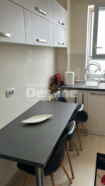 Apartament cu 2 camere mobilat utilat, cu loc de parcare parcare, zona Coresi