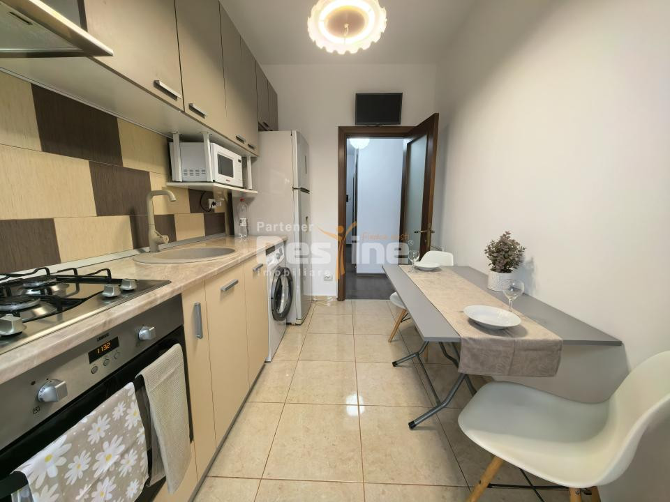 Apartament 3 camere 66 mp mobilat, cu balcon, gradina și loc de parcare subteran