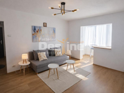 Apartament cu 2 camere, etaj intermediar, renovat situat in cartierul Tractorul 