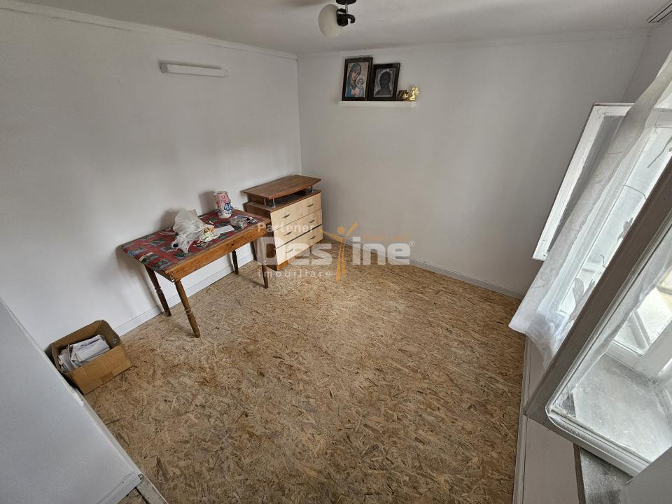 Casă individuală 2 camere + anexă in construcție - 250 mp teren - Bârlad 