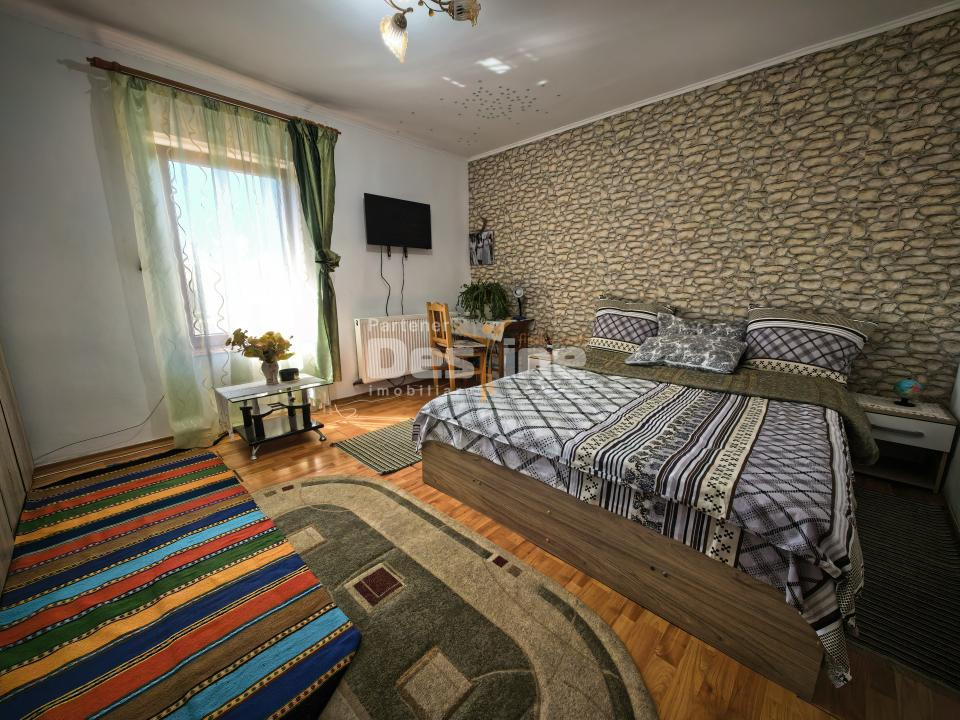 Casă 4 camere plan parter cu beci și anexe + 720 mp curte 