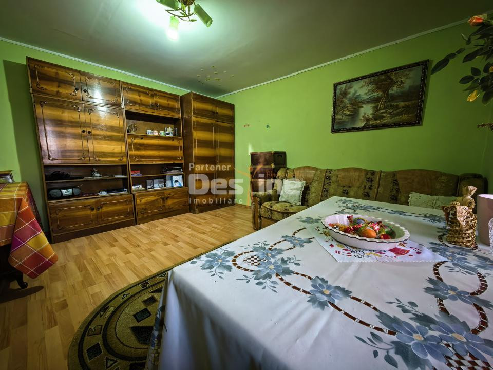 Casă 4 camere plan parter cu beci și anexe + 720 mp curte 