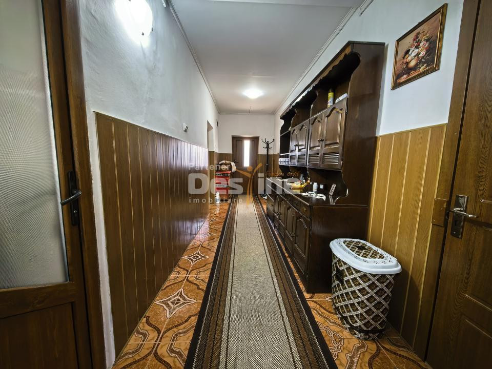 Casă 4 camere plan parter cu beci și anexe + 720 mp curte 