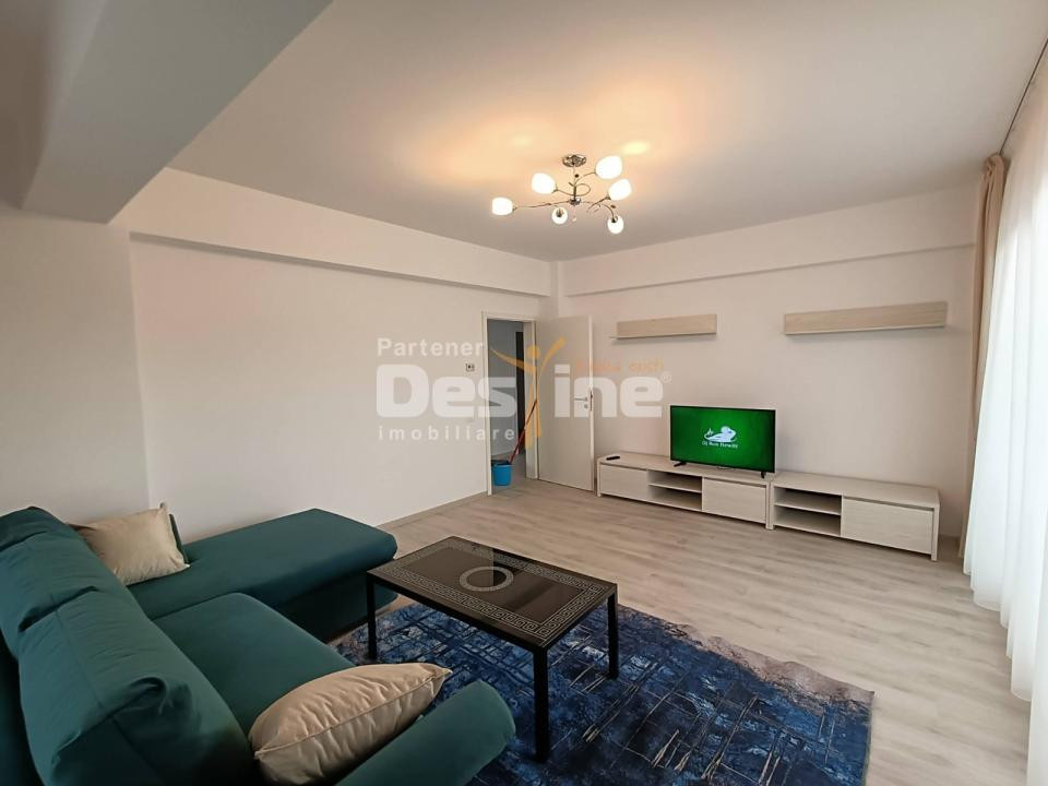 Apartament cu 3 camere, balcon 20 mp, loc de parcare acoperit, 2 bai, Tractorul