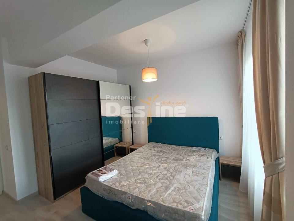 Apartament cu 3 camere, balcon 20 mp, loc de parcare acoperit, 2 bai, Tractorul