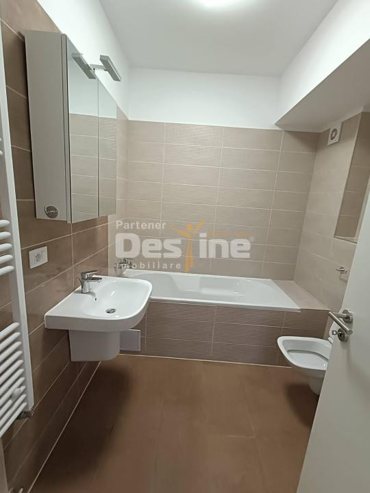 Apartament cu 3 camere, balcon 20 mp, loc de parcare acoperit, 2 bai, Tractorul