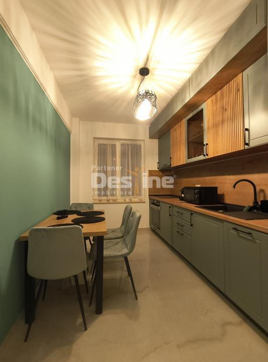 Apartament 3 camere, cu balcon si loc de parcare, situat in cartierul Tractorul