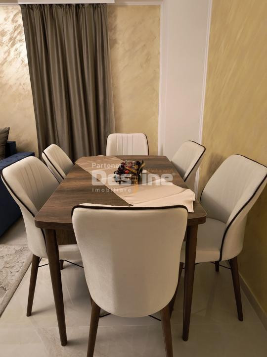 Apartament 3 camere, cu balcon si loc de parcare, situat in cartierul Tractorul