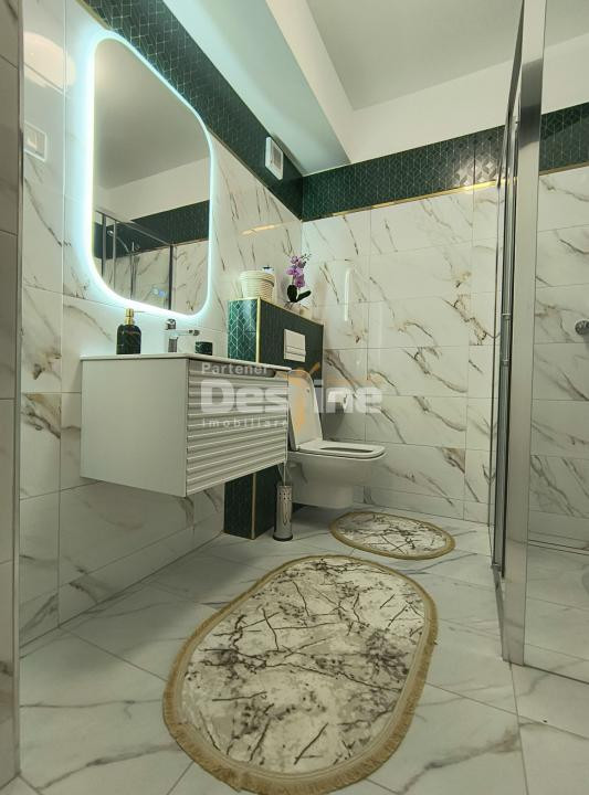 Apartament 3 camere, cu balcon si loc de parcare, situat in cartierul Tractorul