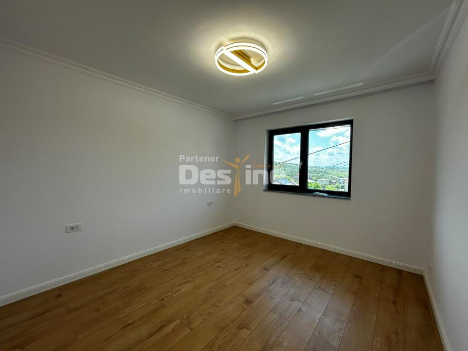 Casă individuală 4 camere, 100 mp utili, curte 400 mp, beci și 2 locuri parcare