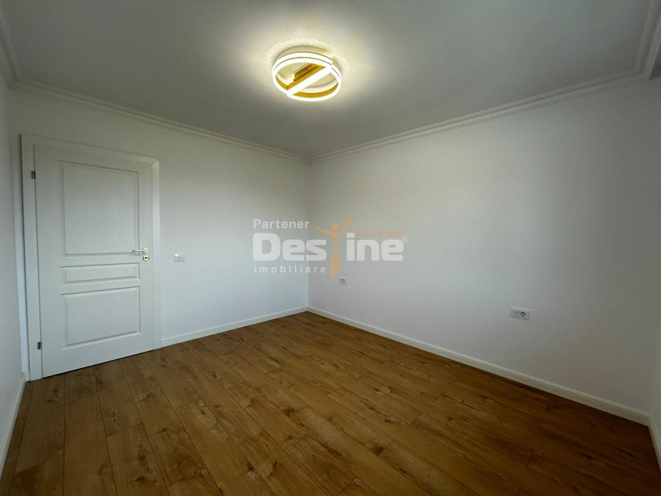 Casă individuală 4 camere, 100 mp utili, curte 400 mp, beci și 2 locuri parcare