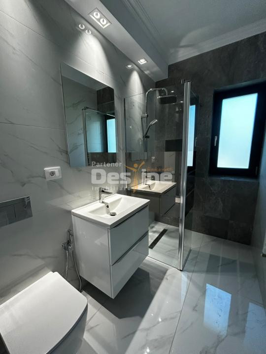 Casă individuală 4 camere, 100 mp utili, curte 400 mp, beci și 2 locuri parcare
