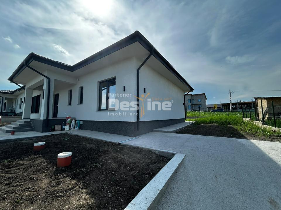 Casă individuală 4 camere, 100 mp utili, curte 450 mp Breazu