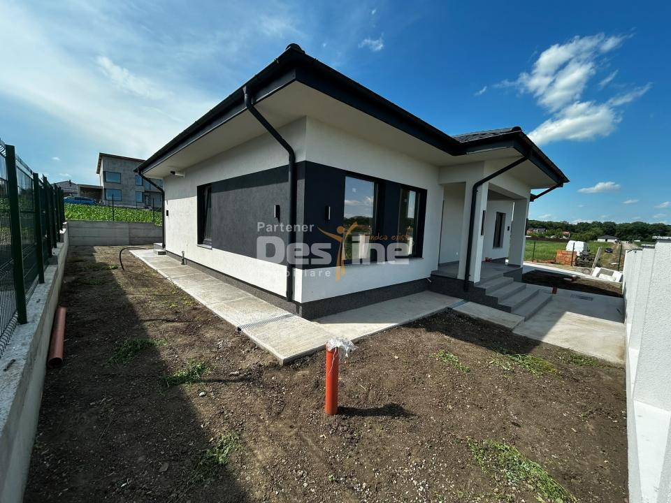 Casă individuală 4 camere, 100 mp utili, curte 450 mp Breazu