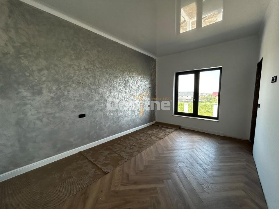 Casă individuală 4 camere, 100 mp utili, curte 450 mp Breazu