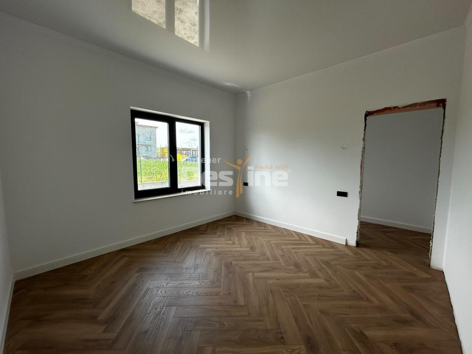 Casă individuală 4 camere, 100 mp utili, curte 450 mp Breazu