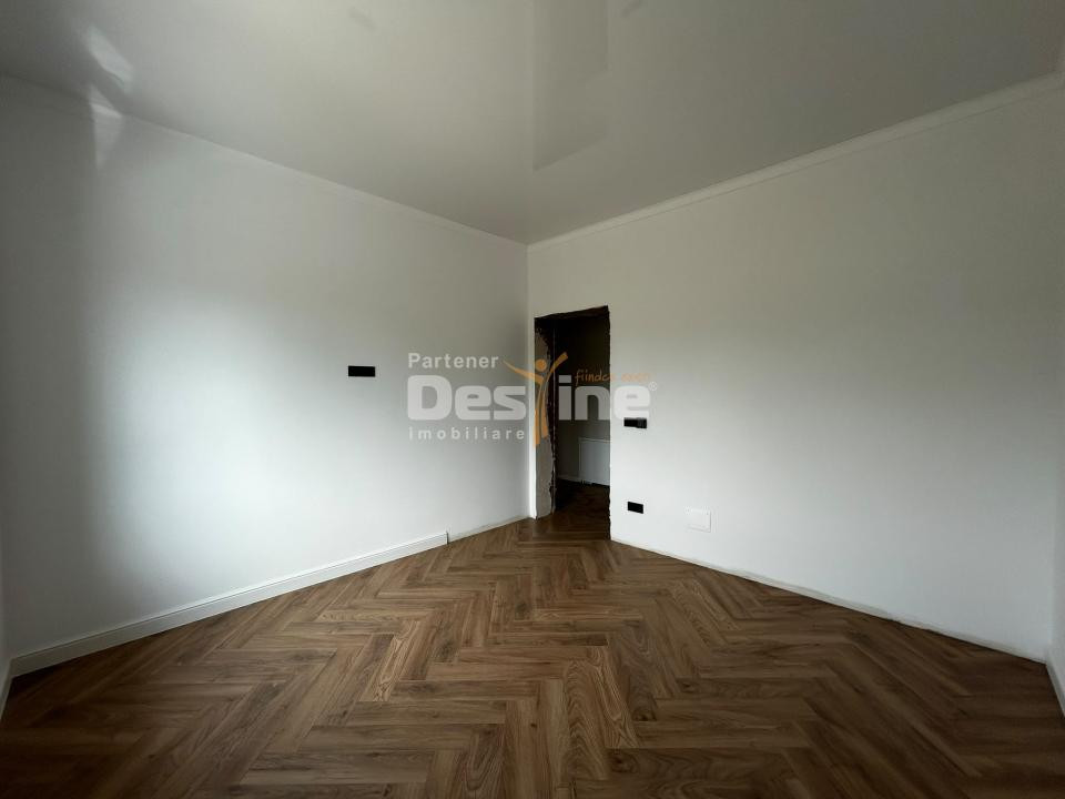 Casă individuală 4 camere, 100 mp utili, curte 450 mp Breazu