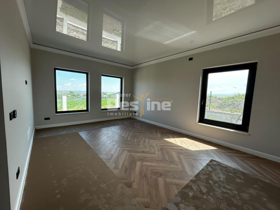 Casă individuală 4 camere, 100 mp utili, curte 450 mp Breazu