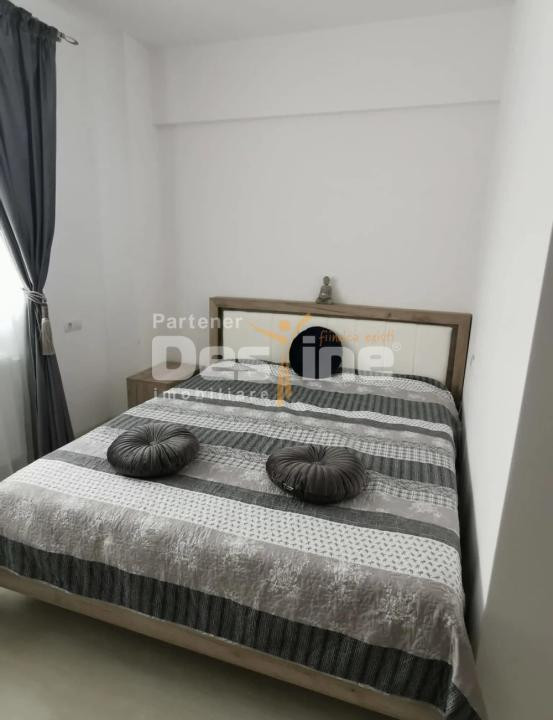 Apartament cu 2 camere 50 mp,  cu loc  de  parcare  inclus,  situat in Tractorul