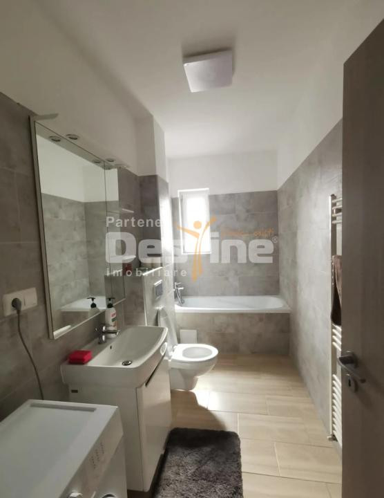 Apartament cu 2 camere 50 mp,  cu loc  de  parcare  inclus,  situat in Tractorul