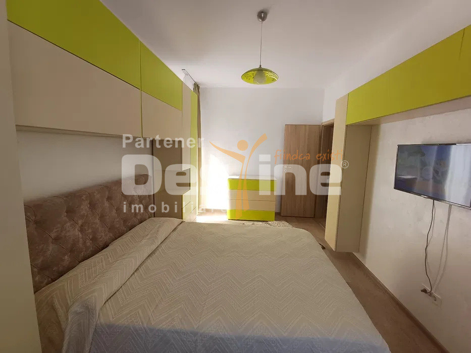 Apartament cu 2 camere decomandat, etajul 1 balcon si loc de parcare, Tractorul 