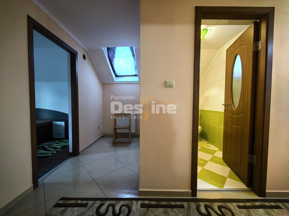 Casă individuală 4 camere 2 garaje 150 mp + anexa și gradina