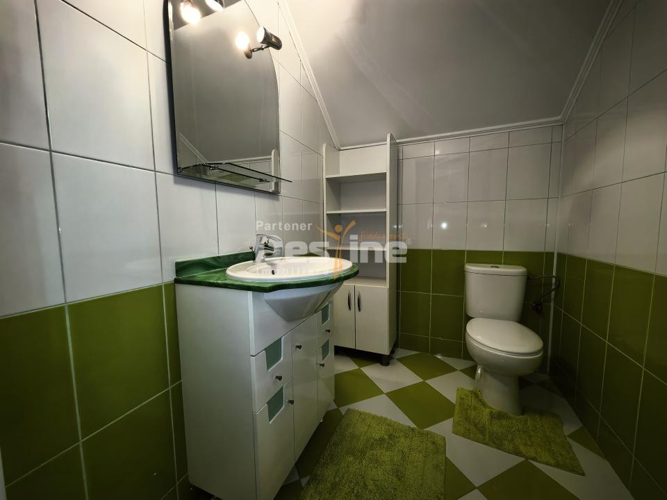 Casă individuală 4 camere 2 garaje 150 mp + anexa și gradina