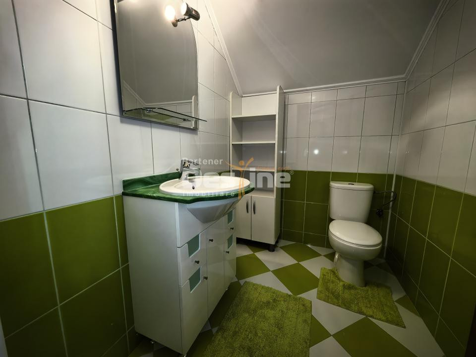 Casă individuală 4 camere 2 garaje 150 mp + anexa și gradina