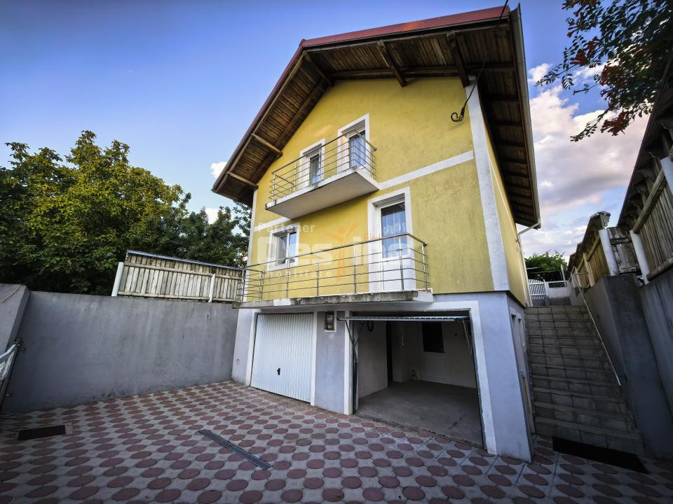 Casă individuală 4 camere 2 garaje 150 mp + anexa și gradina